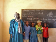 School teacher and children (click to enlarge)